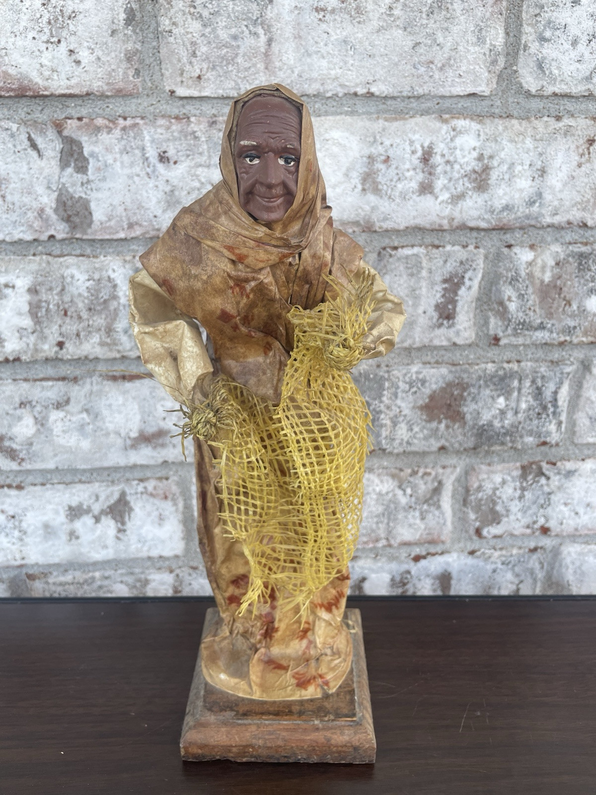 Vintage Folk Art Figurine Paper Mache Old Woman In Long Dress Carrying A Net 12”