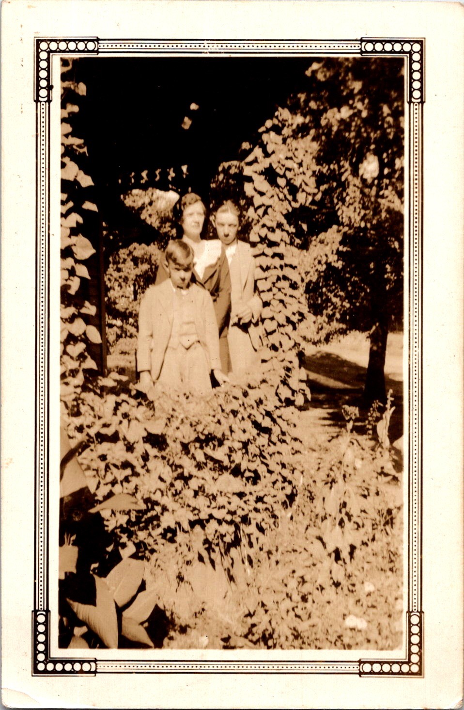Family Portrait in Garden, 1920s Sepia Snapshot Photo