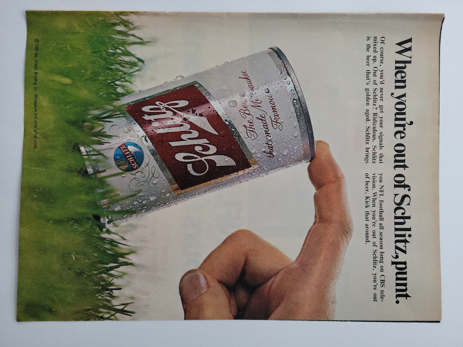1969 Schlitz Beer Can football punt vintage ad