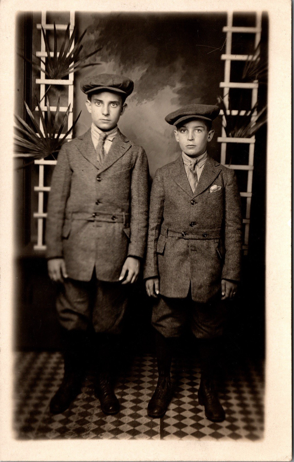 Postcard Real Photo RPPC Brothers Posing in Identical Outfits Wearing Caps