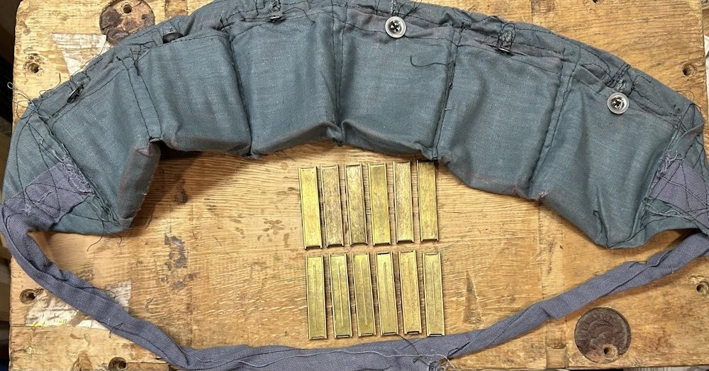 WWII-era 8mm Mauser Stripper Clips, 12 w/Bandolier 7.92 Turk/German/Yugo brass WWII-era 8mm Mauser Stripper Clips, 12 w/Bandolier 7.92 Turk/German/Yugo brass