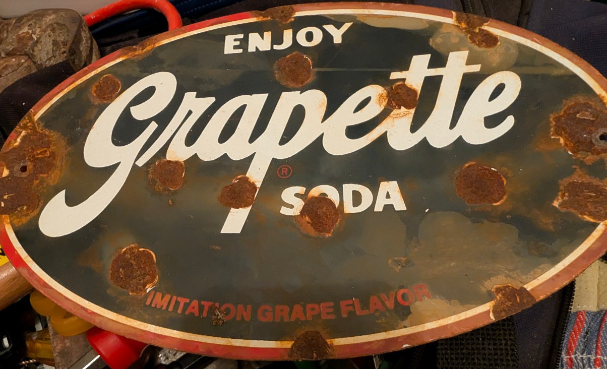 Enjoy Grapette Soda porcelain enamel sign vintage