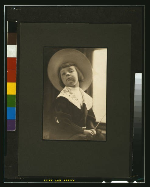 Portrait of a boy in a round hat circa 1900 Historic Old Photo