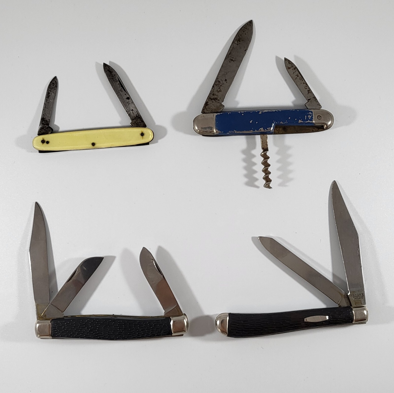 (4) Vintage Folding Pocket Knives Saxonia (Germany) Sabre (Ireland) Camco (USA)
