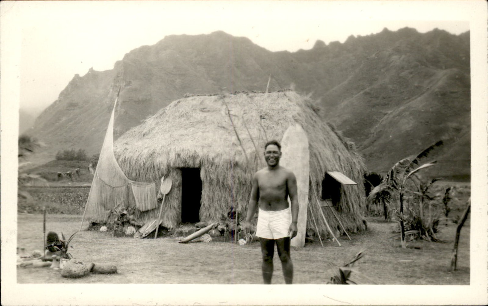 Hawaii HI Man at Grass Hut Surf Board c1920s-30s Real Photo Vintage Postcard bhn