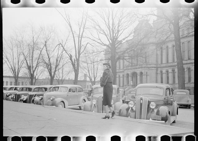 Photo:1930s Street Scene Woman Cars Courthouse Building