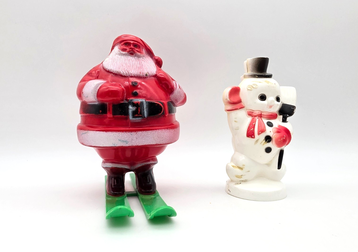 CHRISTMAS VINTAGE ROSBRO SANTA W/SKIS CANDY CONTAINER & SNOWMAN W/BROOM FIGURINE