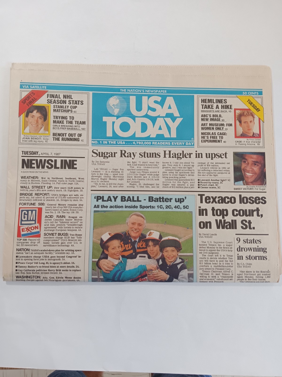 USA TODAY /sugar Ray stuns Hagler in upset April,71987