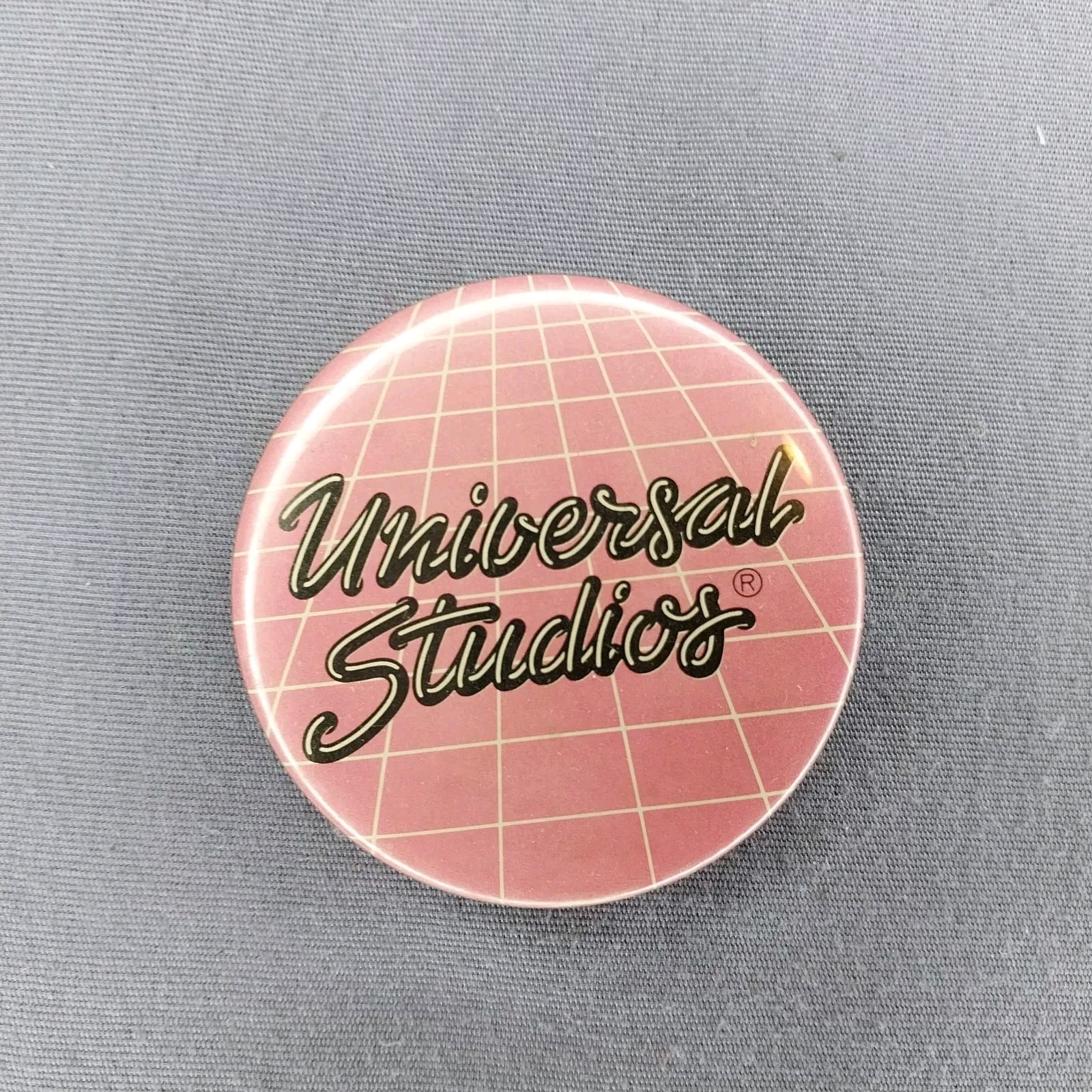 1984 Universal Studios Retro Pink Button Pinback 2 1/4 1984 Universal Studios Retro Pink Button Pinback 2 1/4