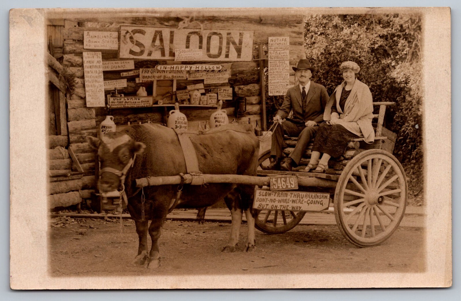 Hot Springs AR~SHARP COUPLE in Ox Cart~Happy Hollow Saloon~UNPTD RPPC Postcard