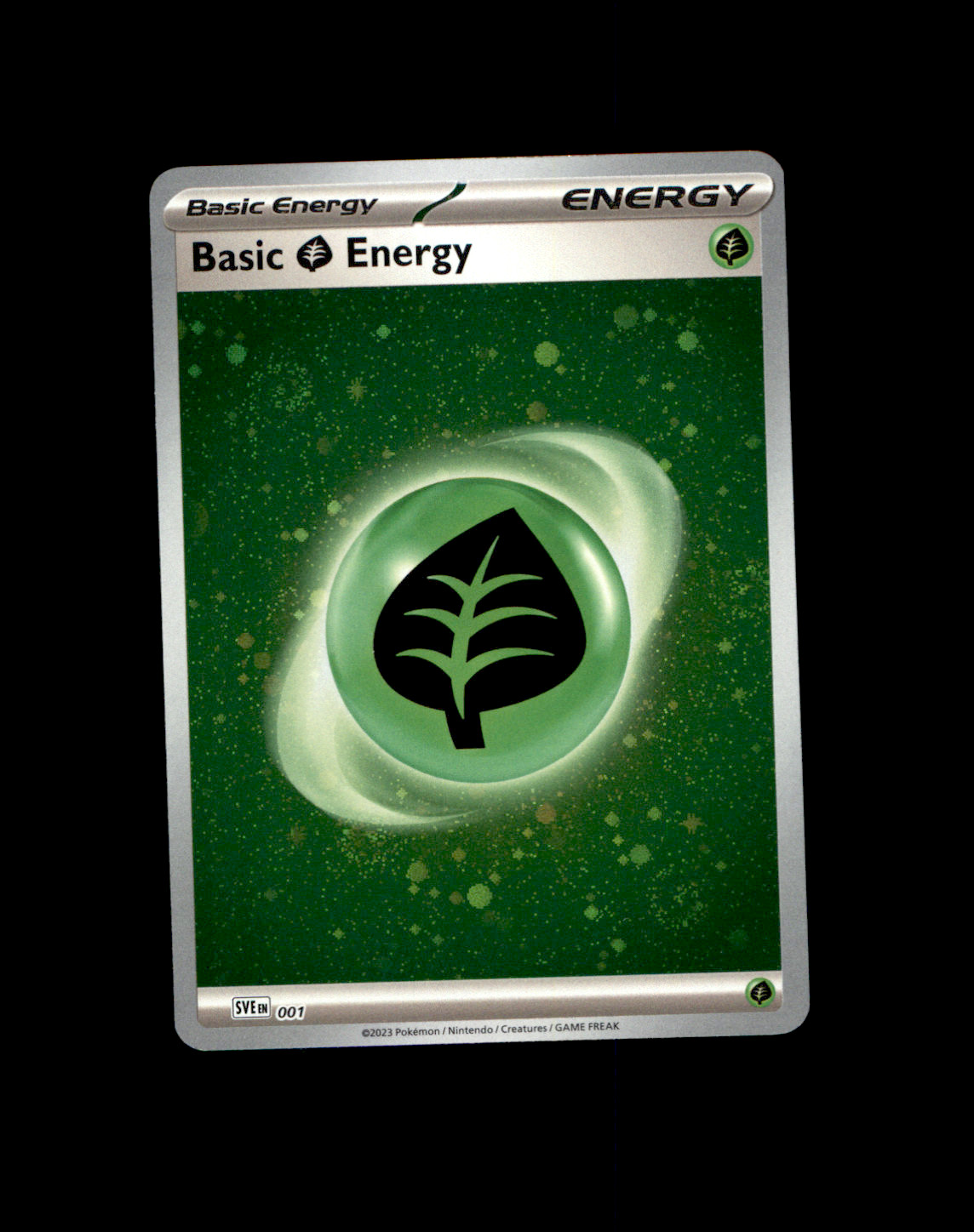 SVE Leaf / Grass Energy Cosmo Holo w/ Swirls SVE 001 NM Pokemon TCG 2 SVE Leaf / Grass Energy Cosmo Holo w/ Swirls SVE 001 NM Pokemon TCG 2