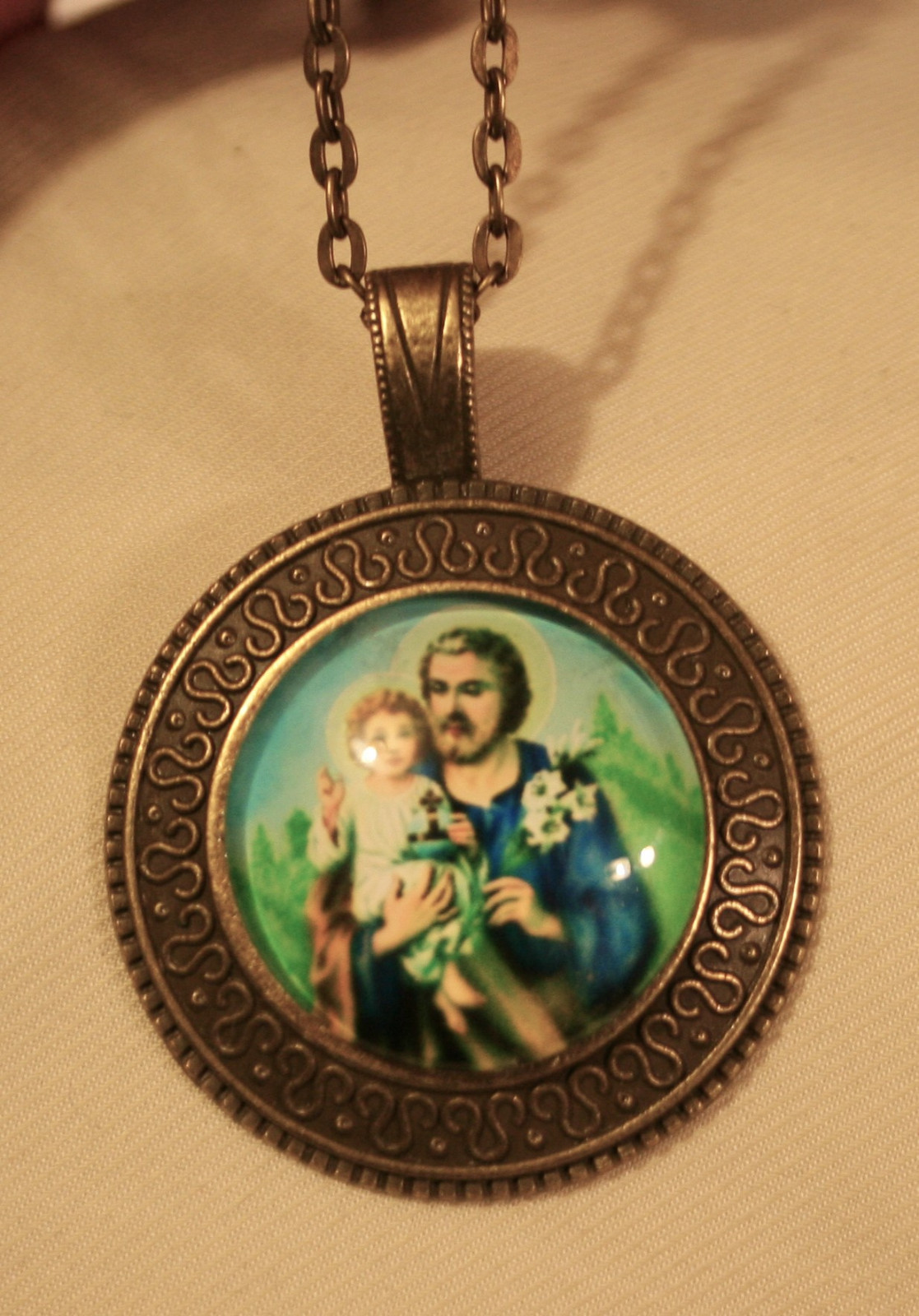 Sloped Swirl Rim Rnd Metal Beaded St. Joseph & Jesus Brasstone Pendant Necklace