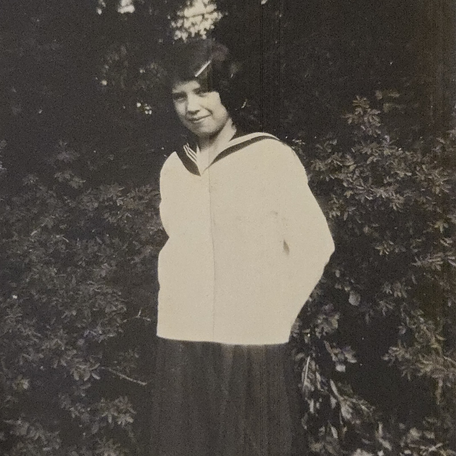 Vintage B&W Photo Snapshot of Young School Girl w/ Hands Behind Back