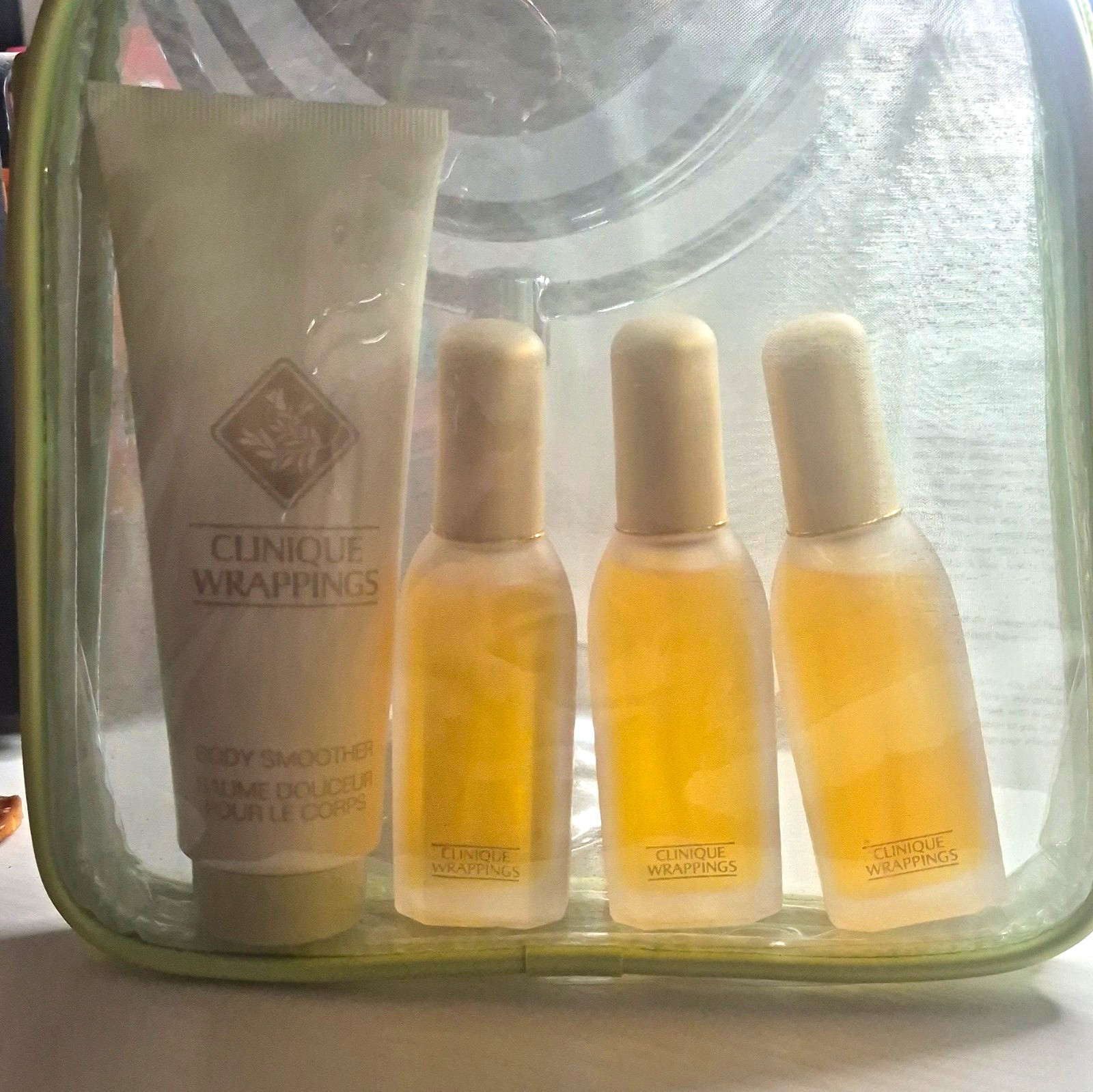 Clinique Wrappings 3 Mini Perfume Spray Bottles + Body Smoother Lotion + Bag