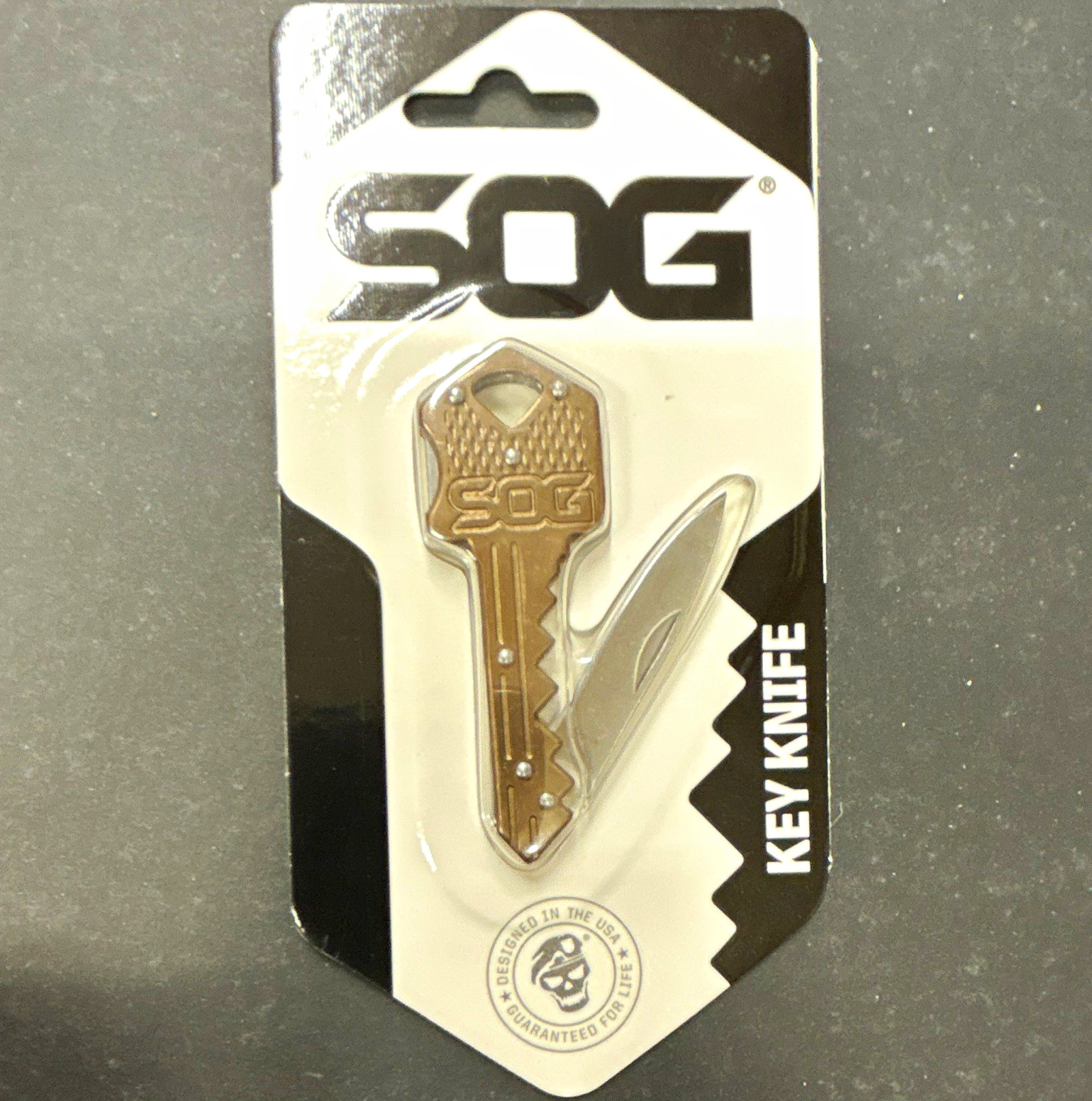SOG KEY-102-CP Stainless steel Key Knife 1 Blade Drop Point Lockback SOG KEY-102-CP Stainless steel Key Knife 1 Blade Drop Point Lockback