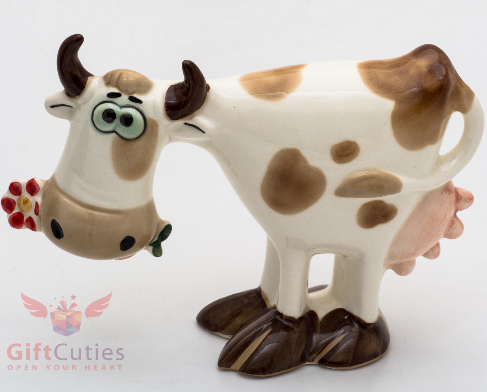 Porcelain Figurine of Cow with the flower Porcelain Figurine of Cow with the flower
