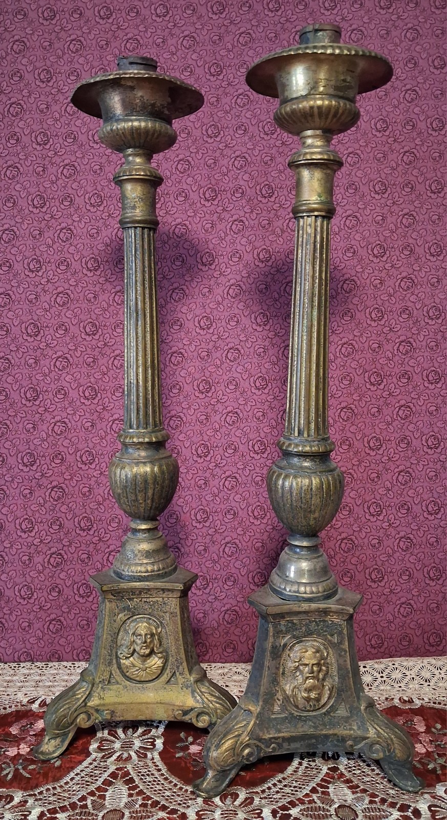Antique Bronze Religious Candle Holders depicting the trinity. Antique Bronze Religious Candle Holders depicting the trinity.