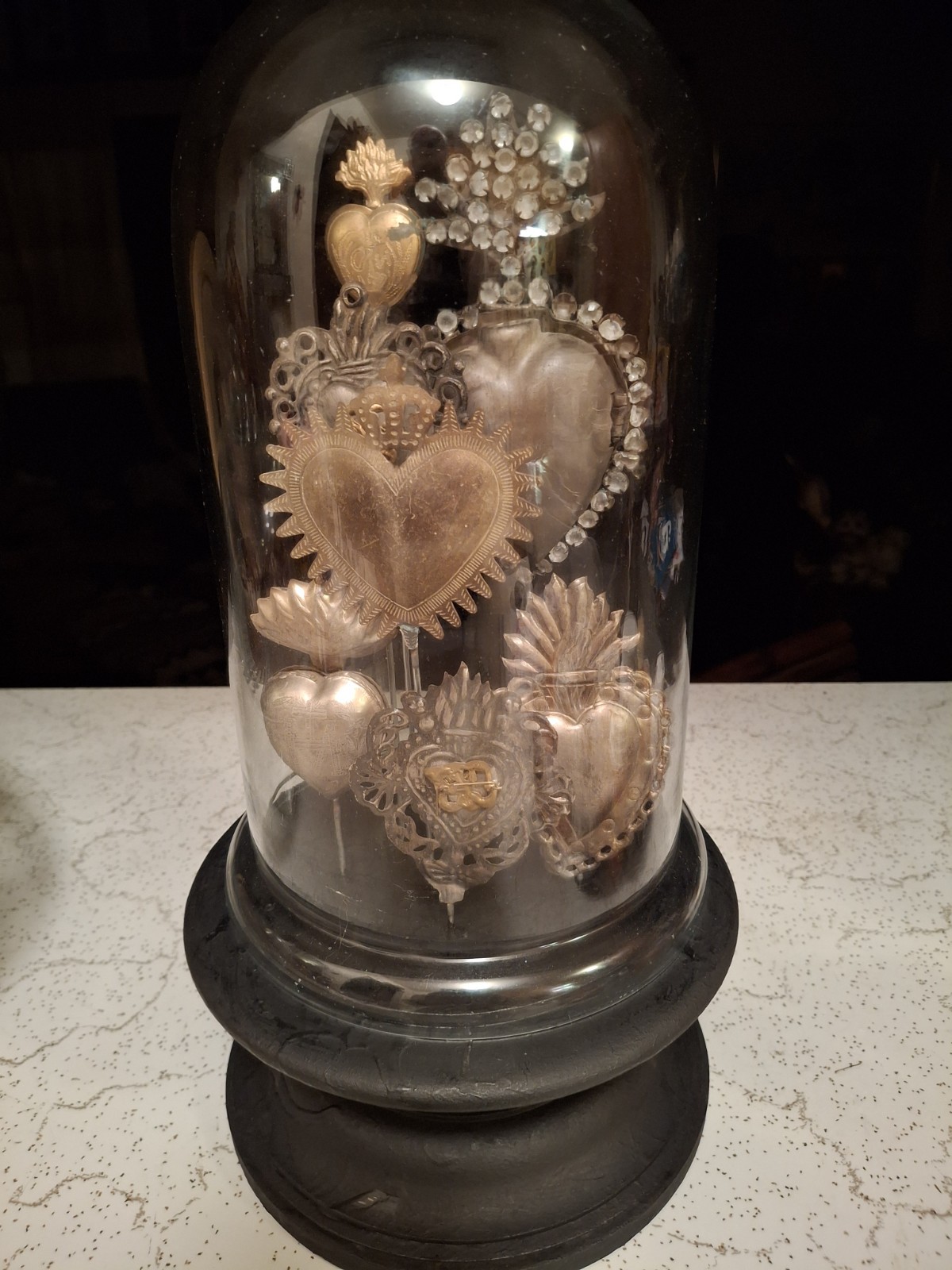 Reproduction Milagros On Black STAND With Glass Dome