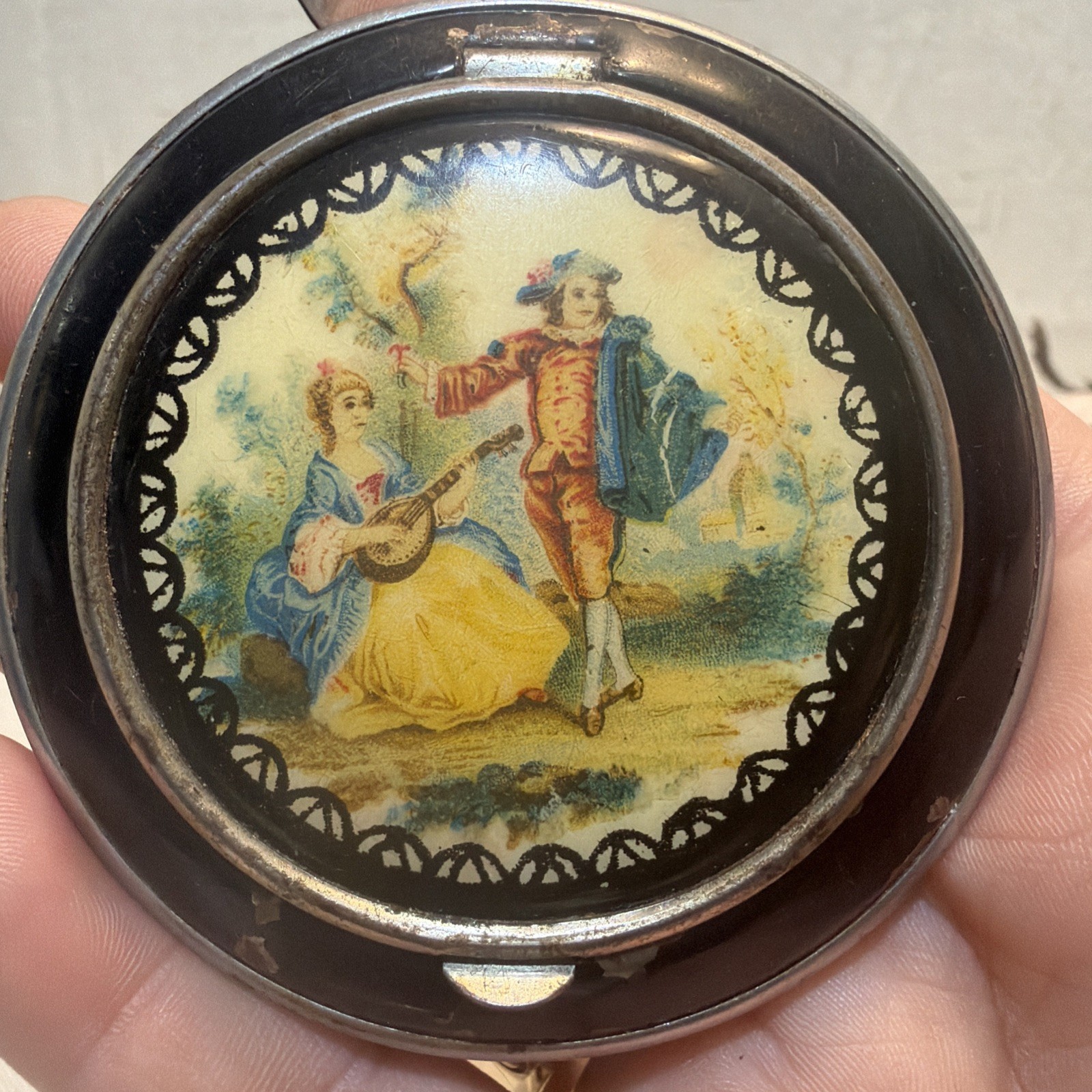 Vintage Round Black Enamel Hinged Compact w/ Courting Couple Design Vintage Round Black Enamel Hinged Compact w/ Courting Couple Design
