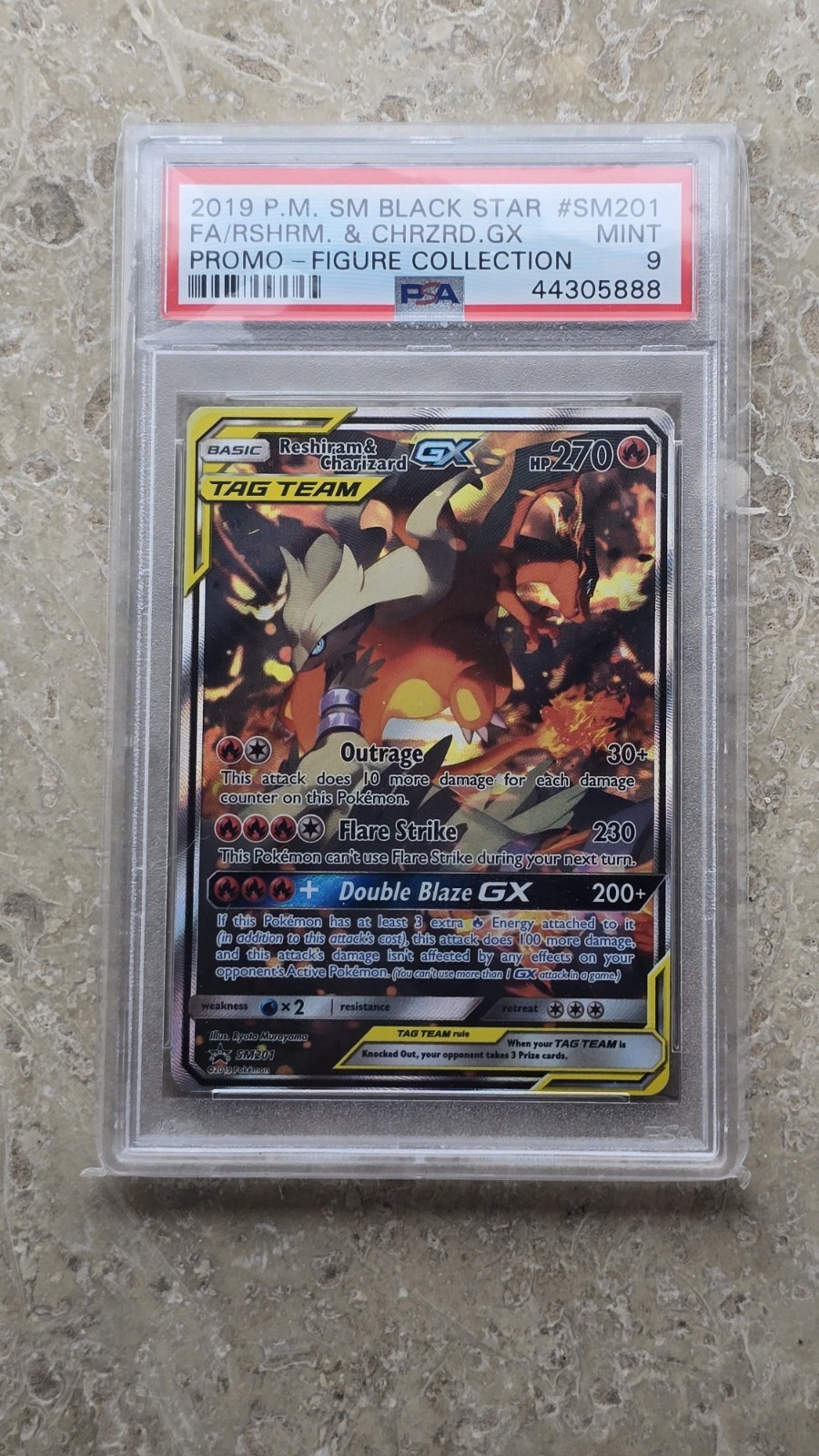Pokemon JCC 2019 SM Black Star Promo SM201 Reshiram & Charizard GX PSA 9 EN