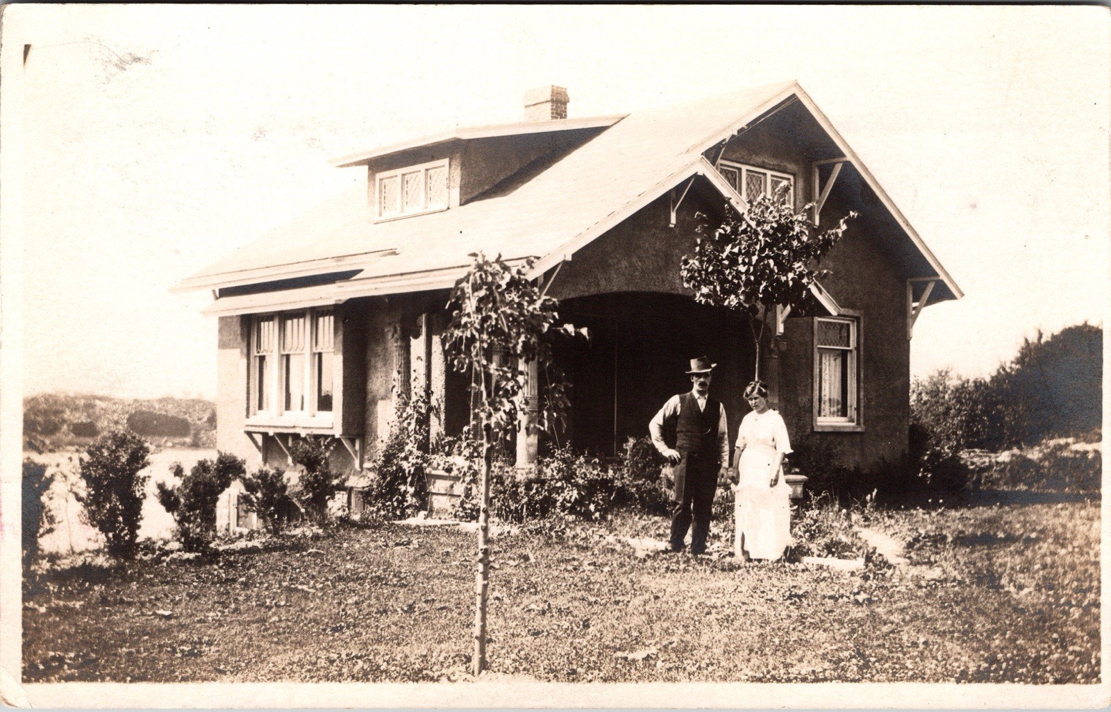 Postcard Real Photo RPPC Man and Woman Standing Outside House Unposted