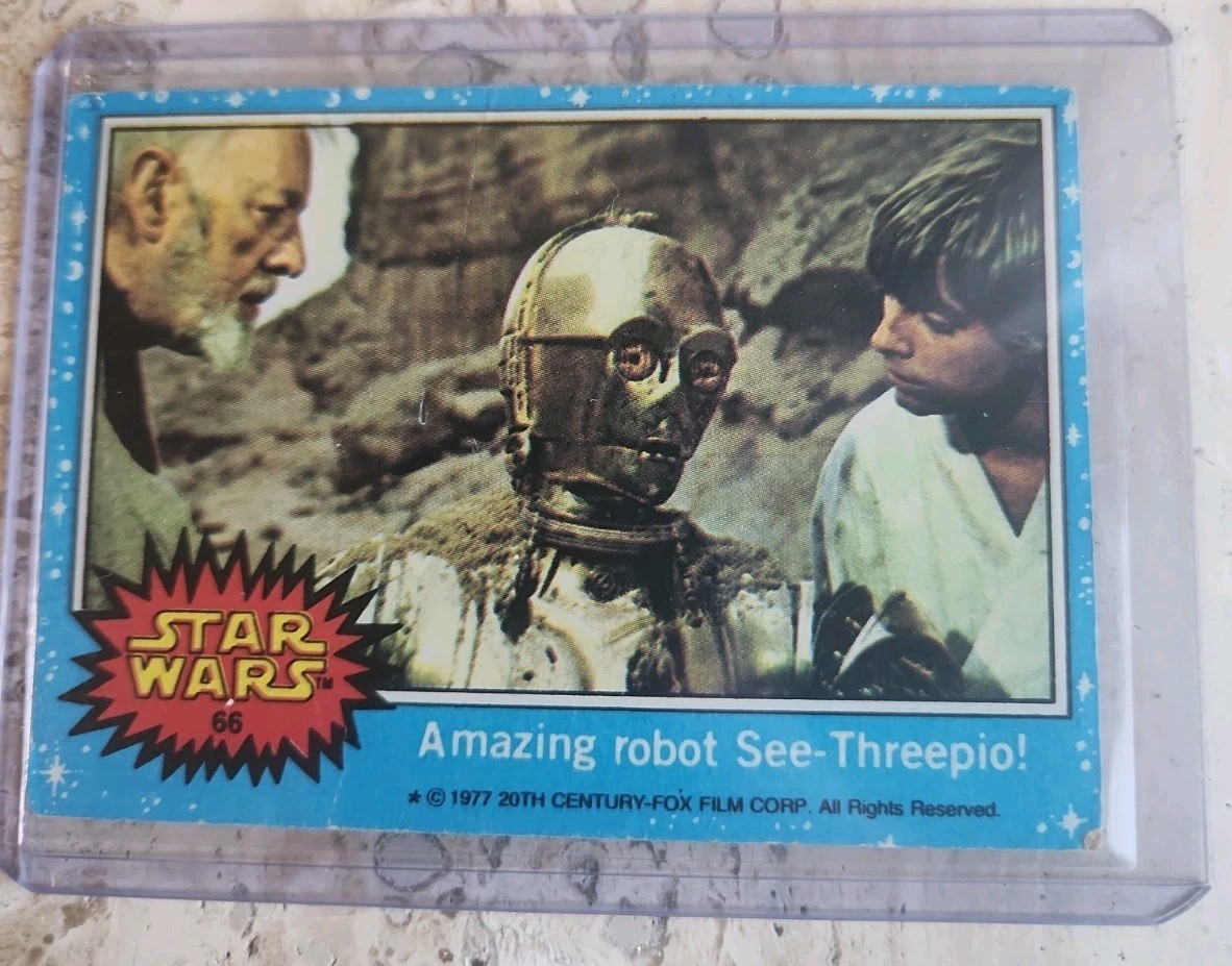 1977 Topps Star Wars #66 Amazing robot See-Threepio Series 1 Blue Ungraded Card