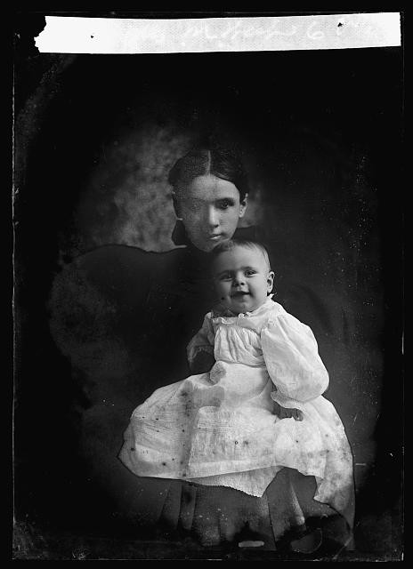 Photo:Max West Woman with Baby Portrait
