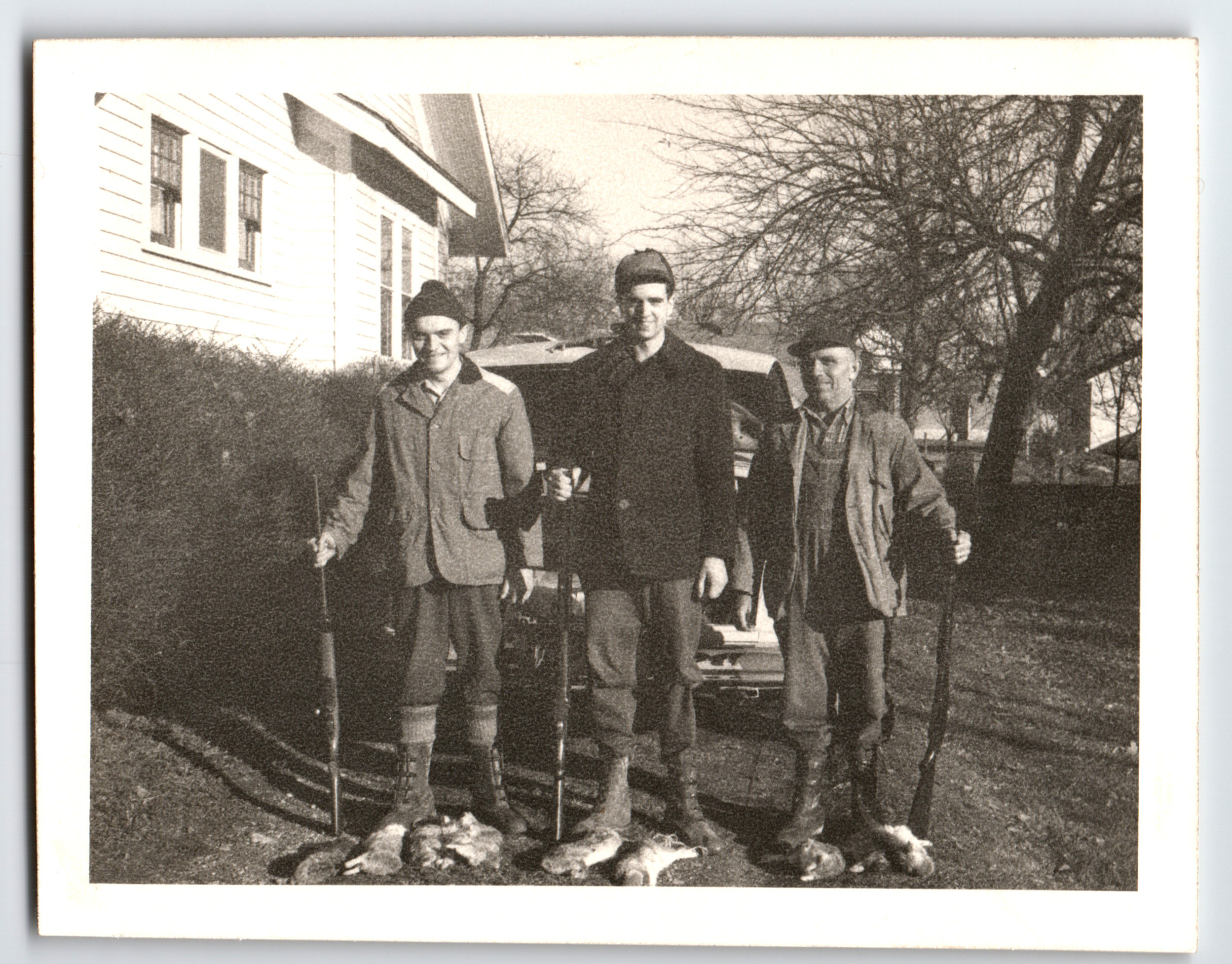 Photo Three Men Hunters Shotguns and Hunted Rabbits by Vehicle Vintage c1940 Photo Three Men Hunters Shotguns and Hunted Rabbits by Vehicle Vintage c1940