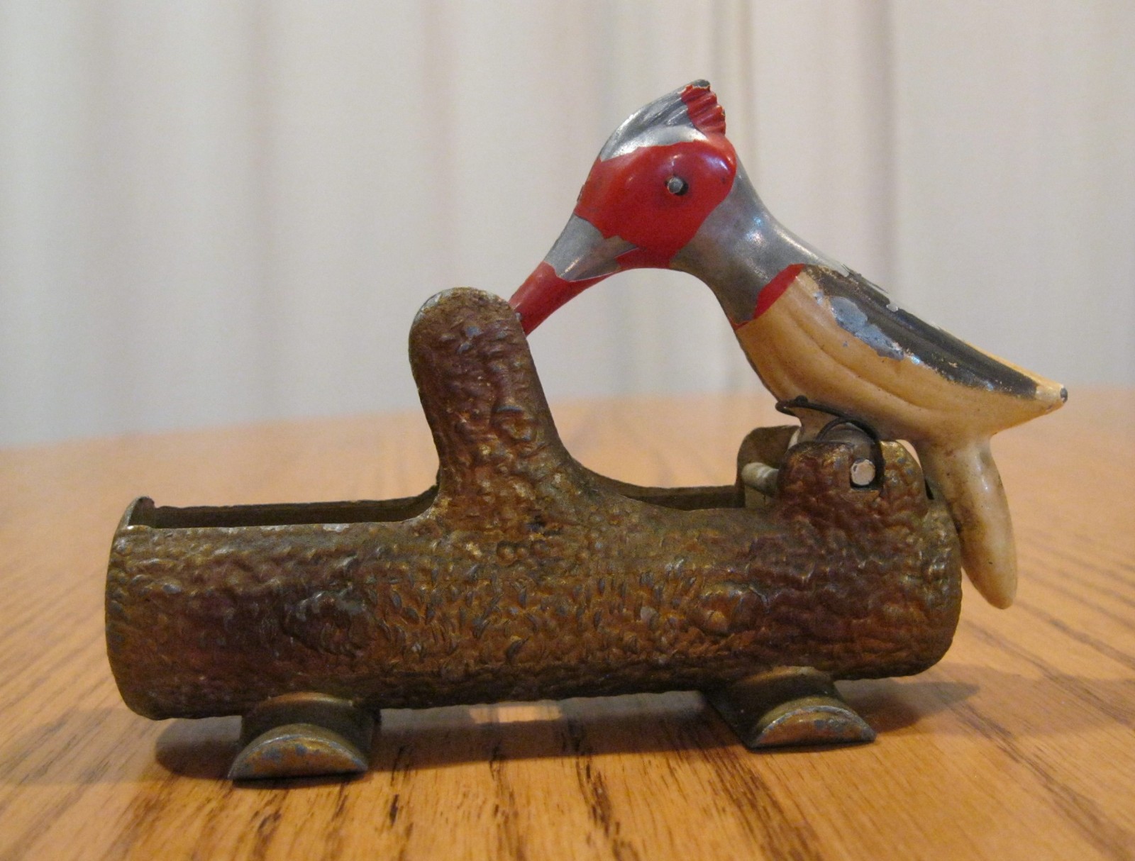 VINTAGE  1950'S  C.I.  METAL  WOODPECKER ON LOG TOOTHPICK  HOLDER/DISPENSER
