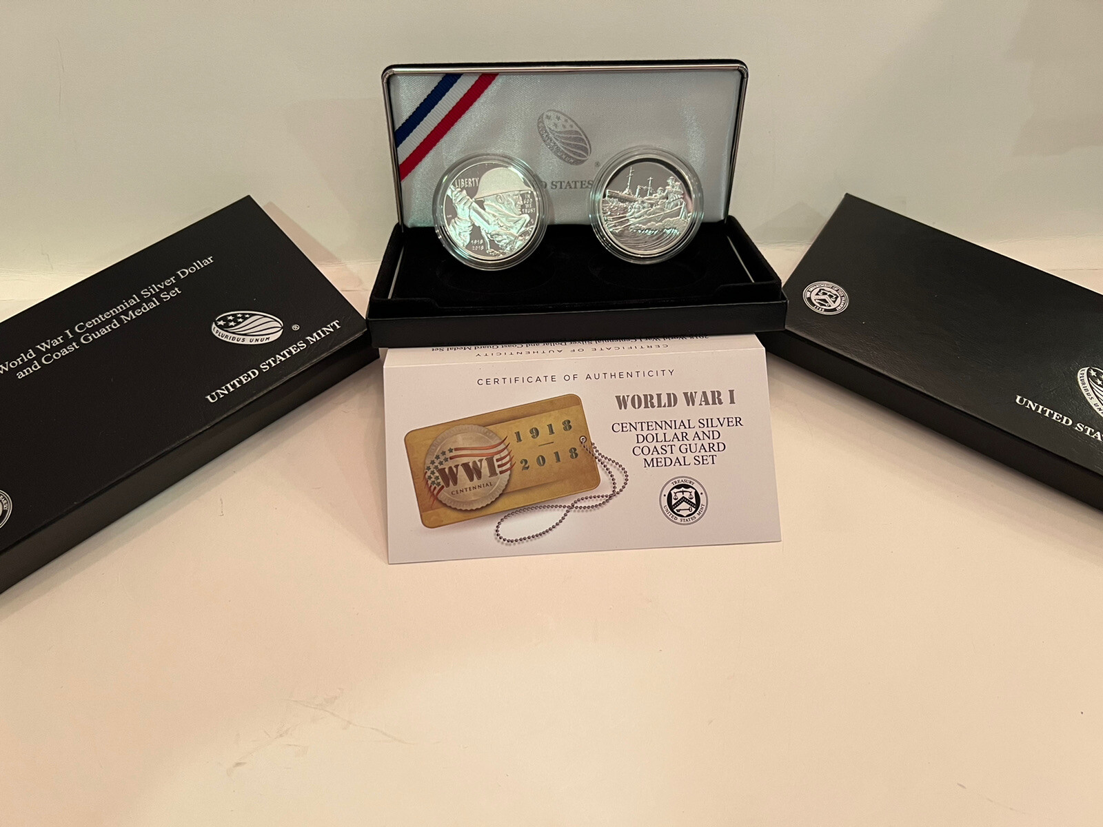2018 P WW 1 CENTENNIAL PROOF SILVER DOLLAR AND COAST GUARD MEDAL SET+OGP+COA. 2018 P WW 1 CENTENNIAL PROOF SILVER DOLLAR AND COAST GUARD MEDAL SET+OGP+COA.