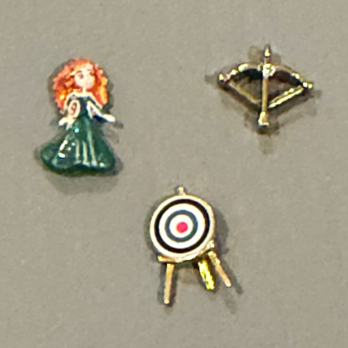 Origami Owl Disney’s Brave Princess Merida with Bow & Arrow target board.