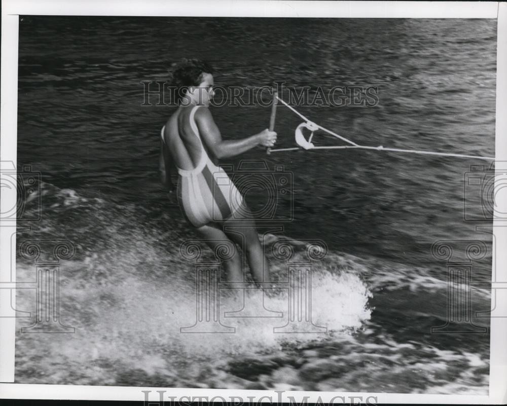 1964 Press Photo A woman water skiing behind a boat - net11704