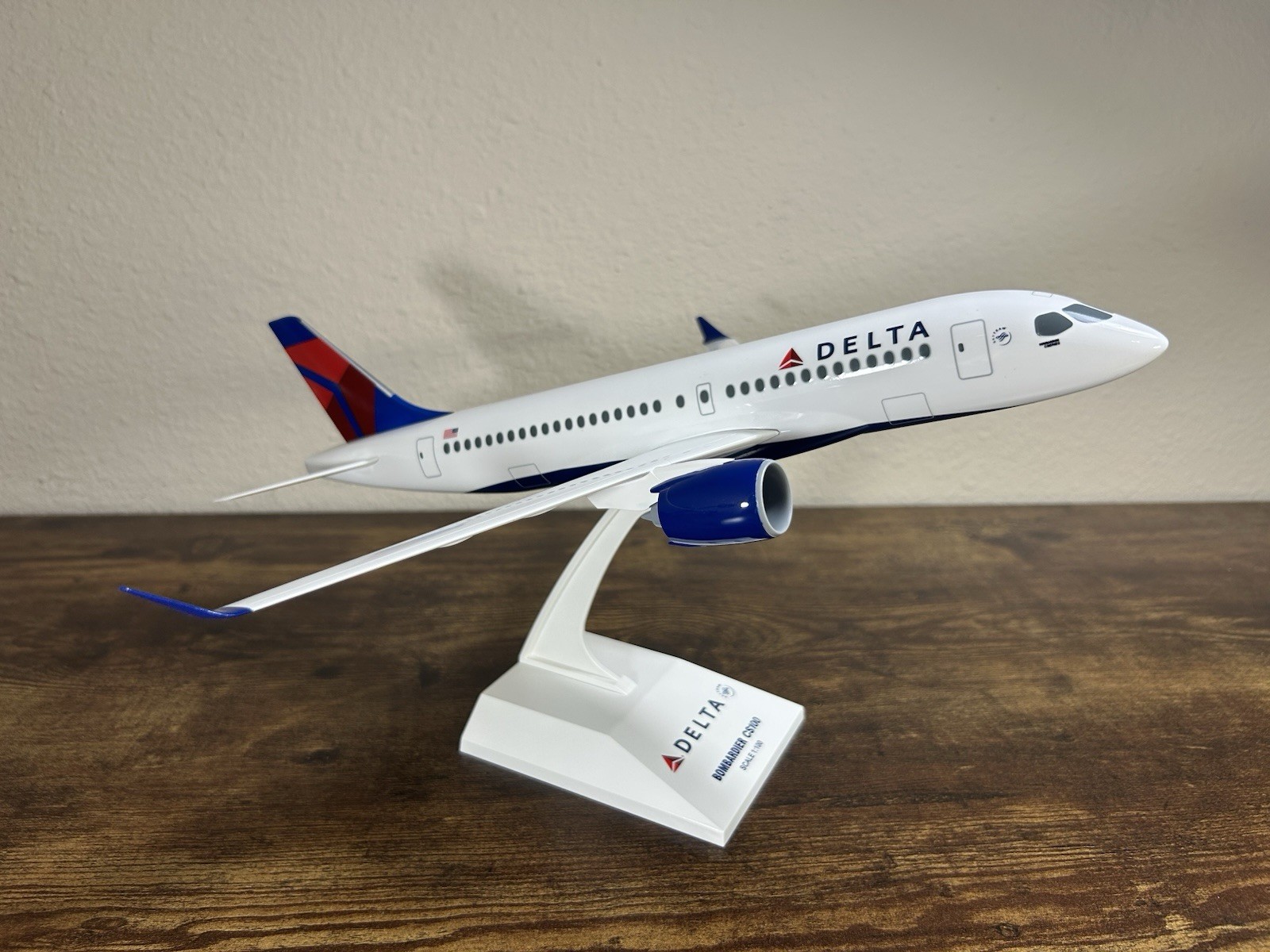SkyMarks 1:100 Delta Air Lines A220-100/CS-100 Model w/ Stand