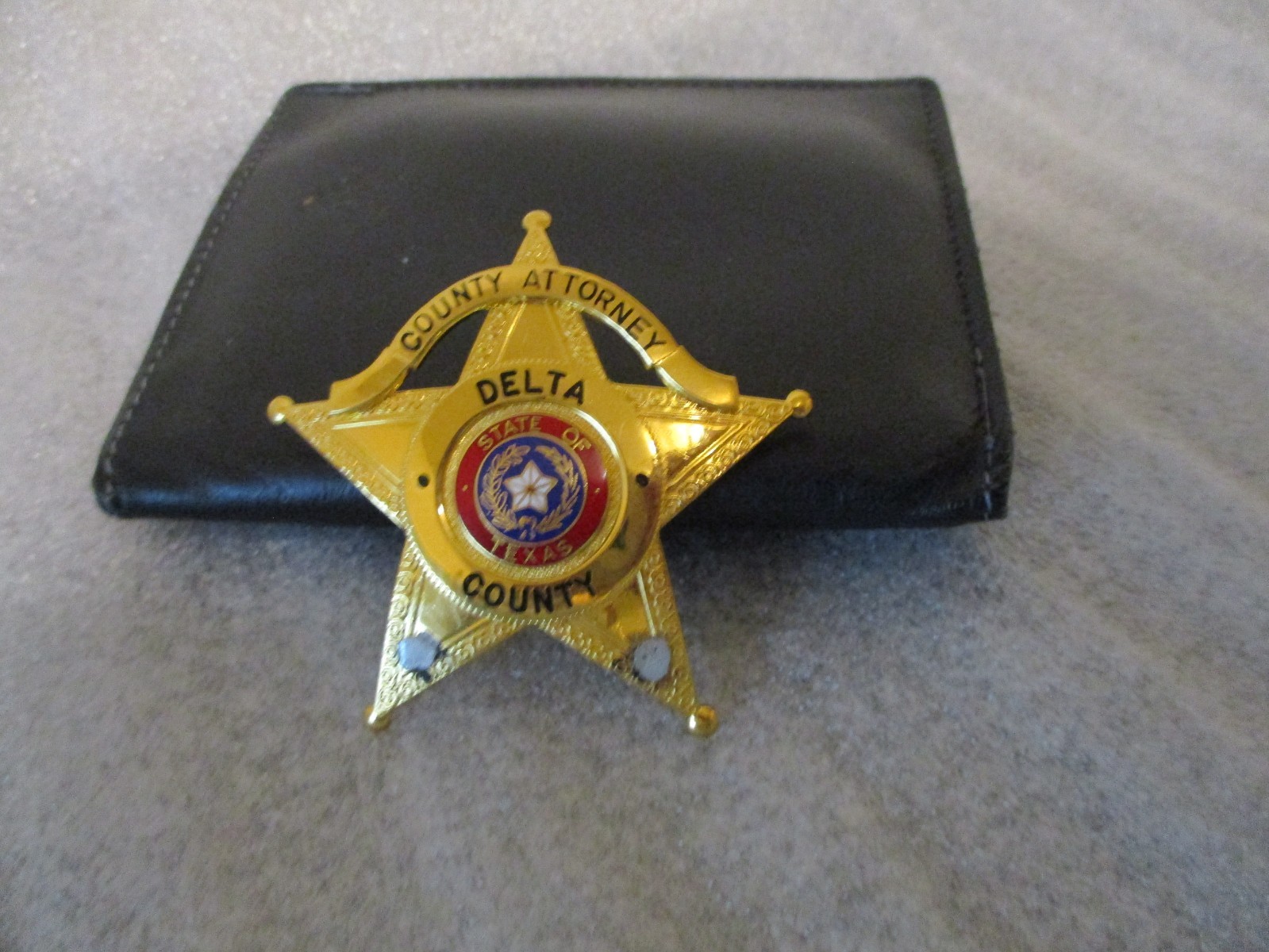 OBSOLETE VINTAGE COUNTY ATTORNEY DELTA COUNTY TEXAS BADGE by BLACKINTON +HOLDER OBSOLETE VINTAGE COUNTY ATTORNEY DELTA COUNTY TEXAS BADGE by BLACKINTON +HOLDER