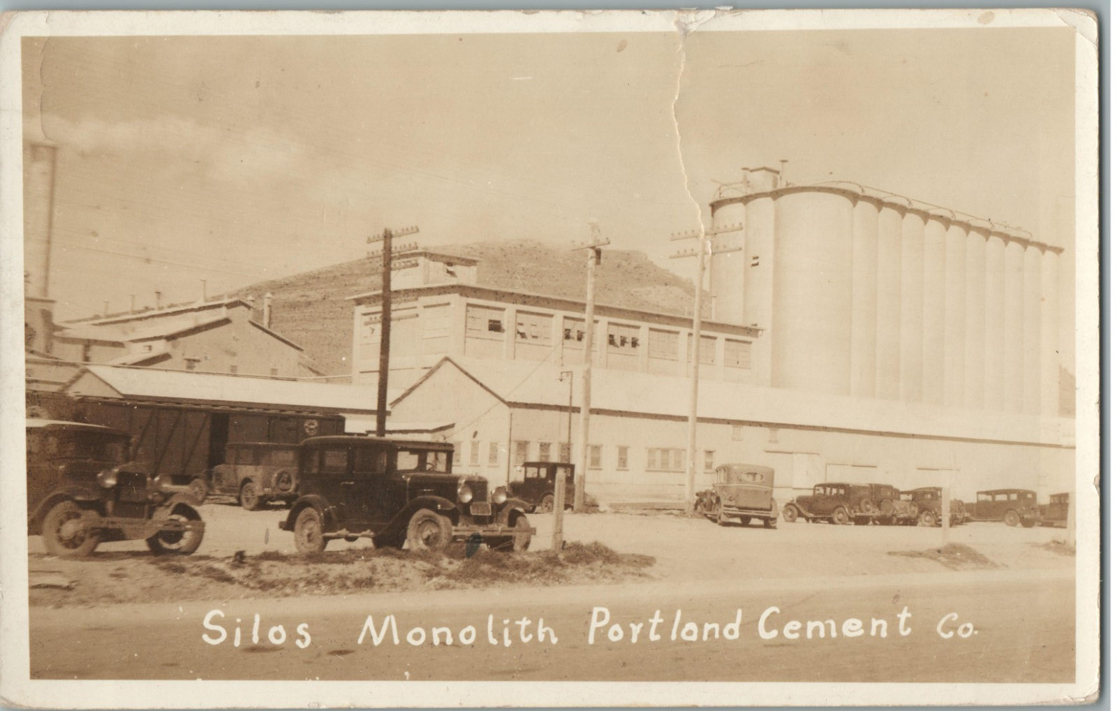 Tehachapi California Monolith Portland Cement Co Silos Old Cars RPPC Postcard