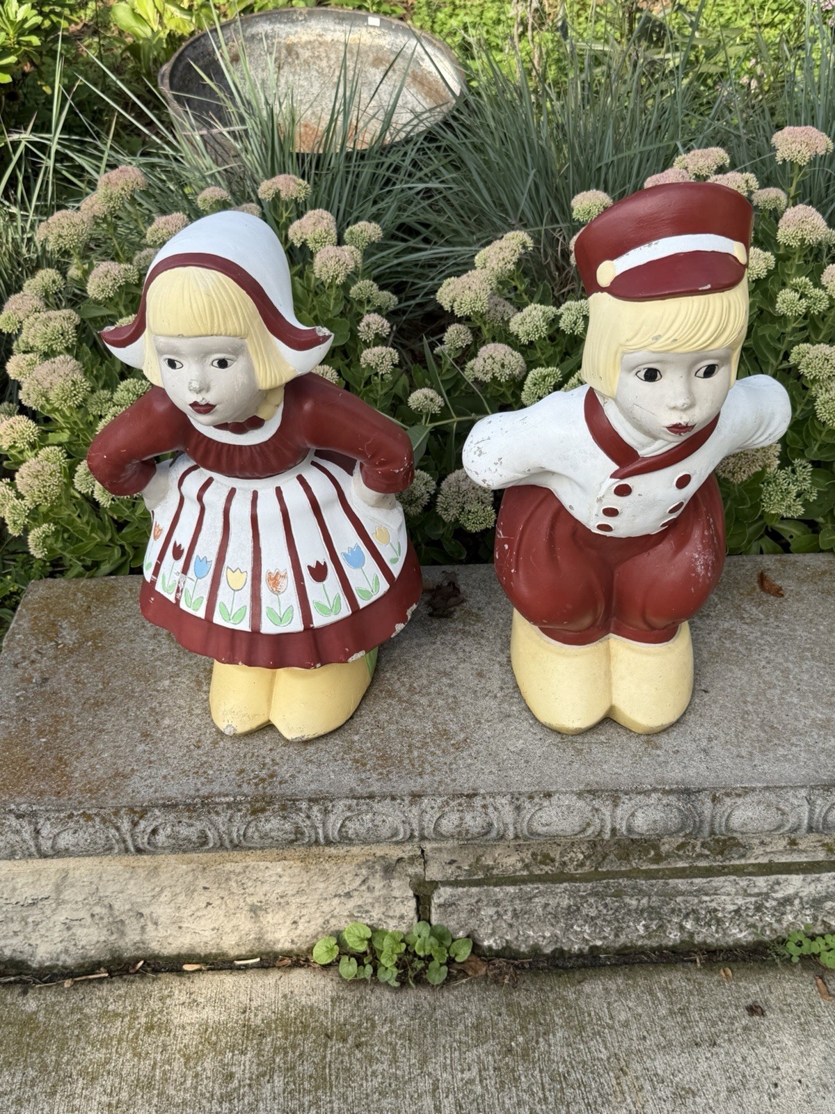 Vintage Concrete Dutch Kissing Boy & Girl Garden Statues. Vintage Concrete Dutch Kissing Boy & Girl Garden Statues.
