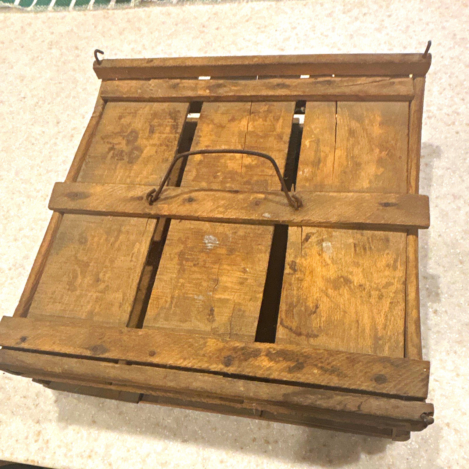 This vintage or antique wooden egg carrier crate, common use for selling eggs