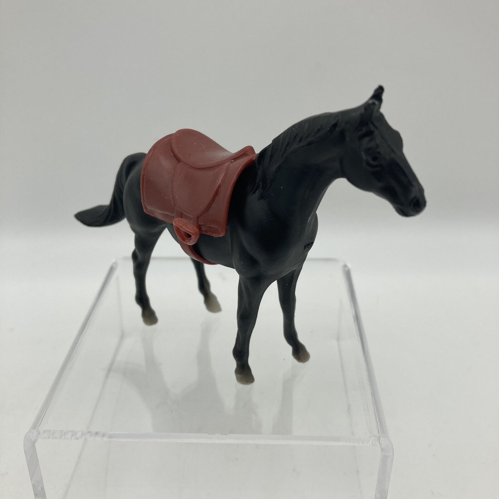 Vintage 1975 Breyer Molding Company Miniature Black Horse w/ Brown Saddle, 3\'\'