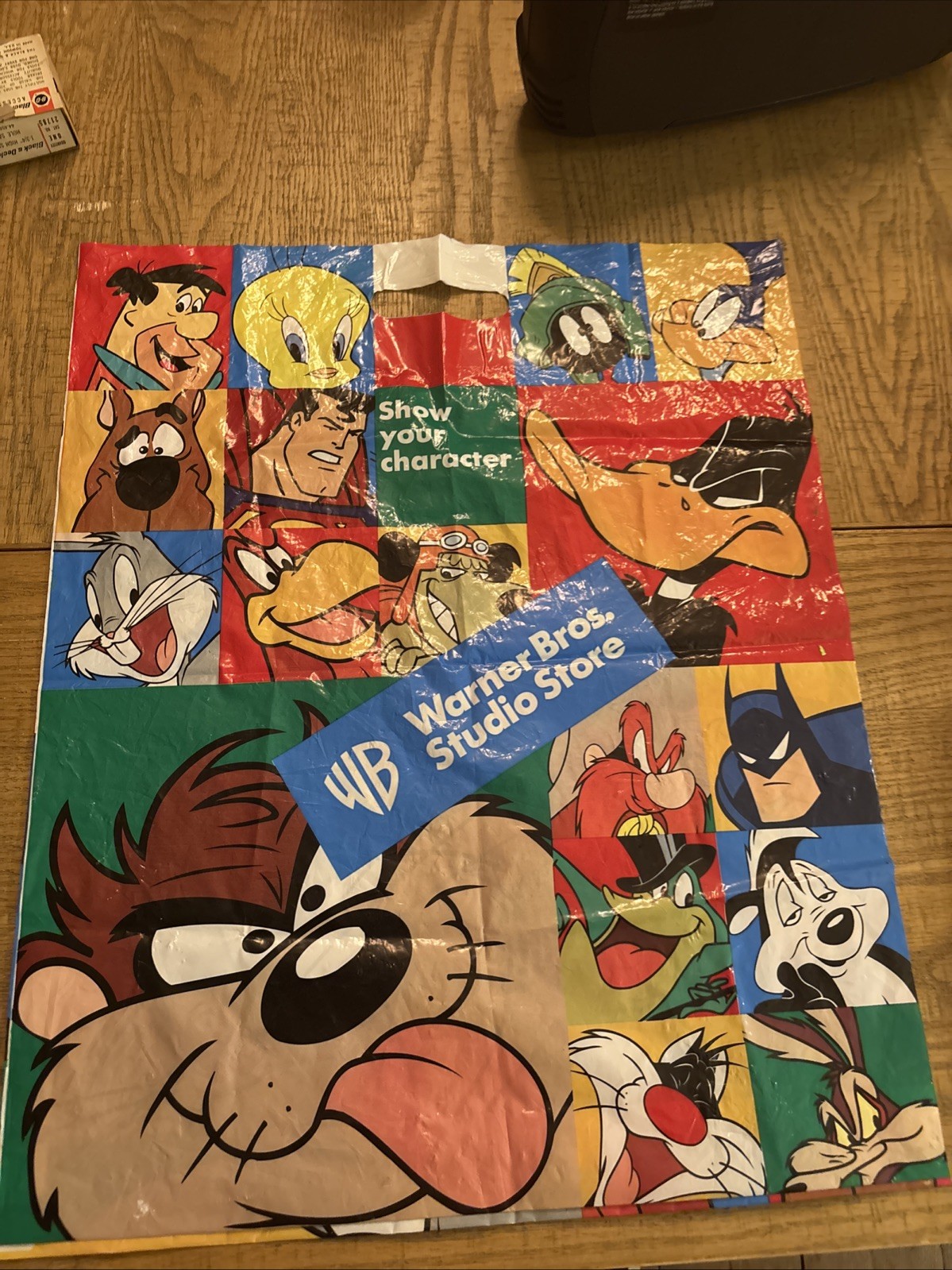 plastic bag - WB Warner Bros. Studio Store, shows multiple WB characters, 1990s