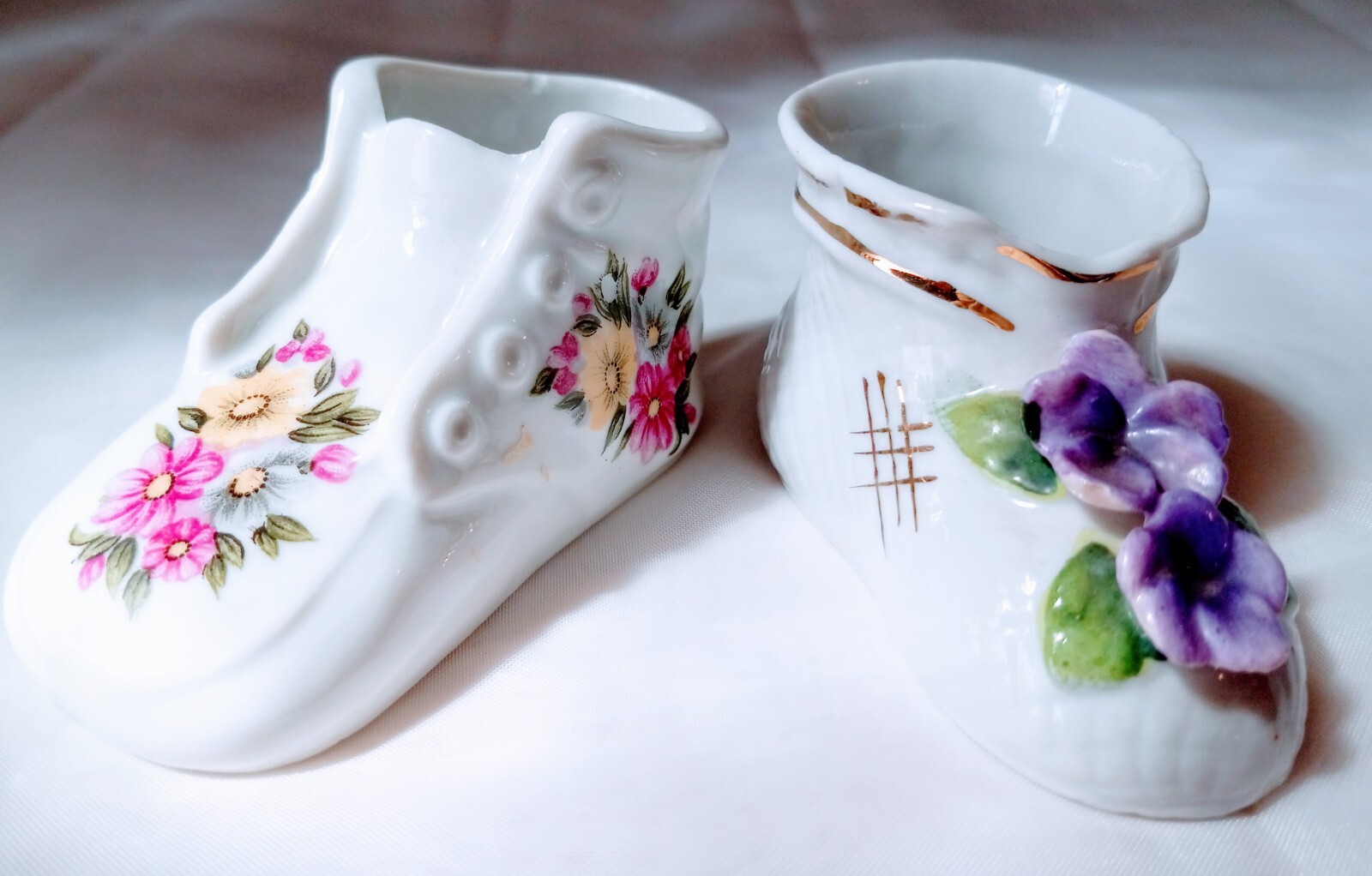 Two Vtg Porcelain Baby Shoes  White with Different Floral Designs. #M.   CT#2