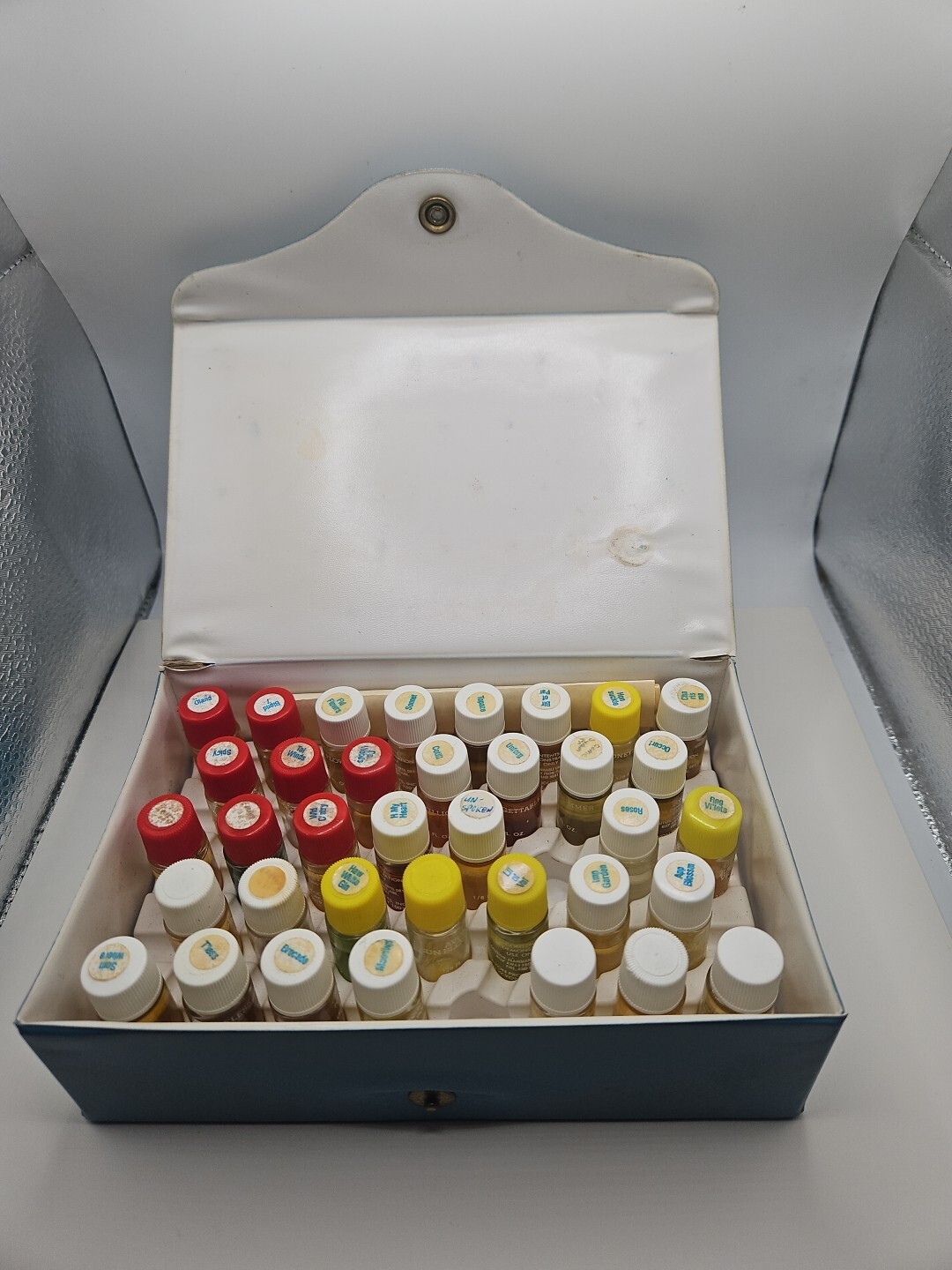 AVON REP, DISPLAY CASE WITH 36 SAMPLES BOTTLES OF AVON COLOGNE