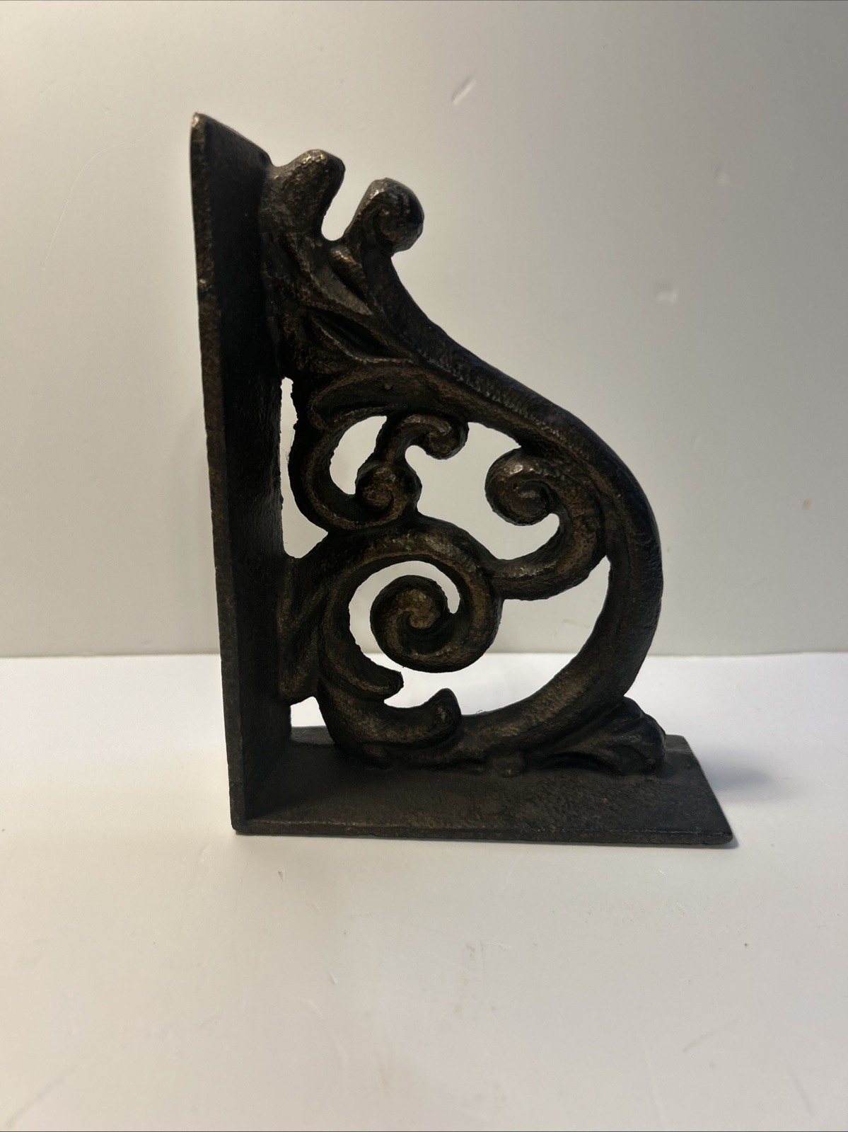 One Elegant Cast Iron Bookend with Intricate Design - Sturdy & Stylish Preowned