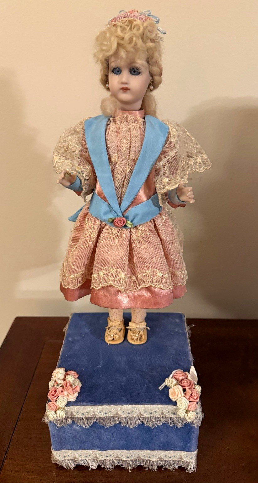 Vintage automated sankyo music box doll in working order