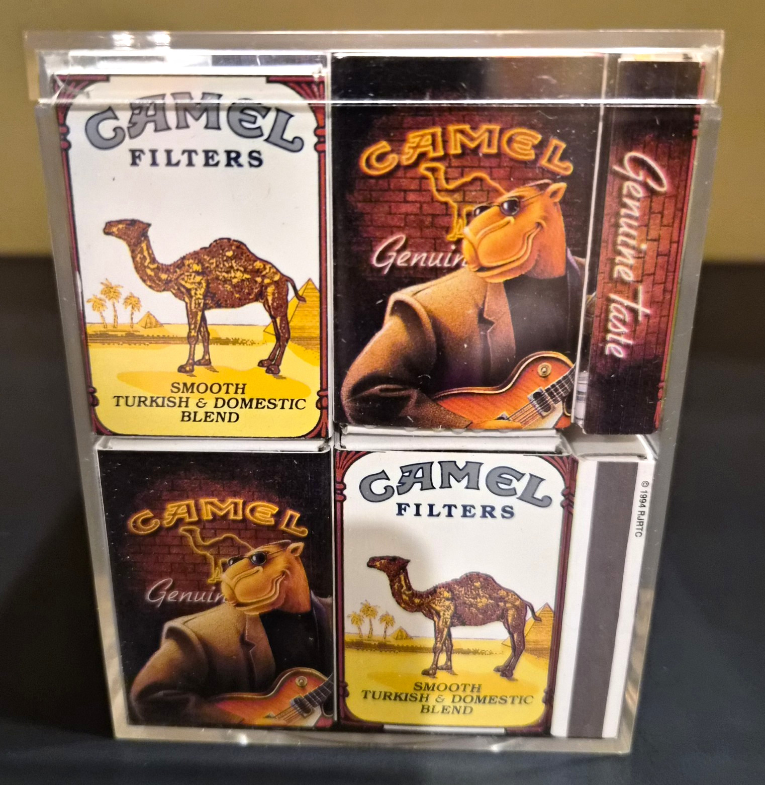 Vintage 1994 Camel Cigarettes promotional match display cube, marked © 1994 RJRT