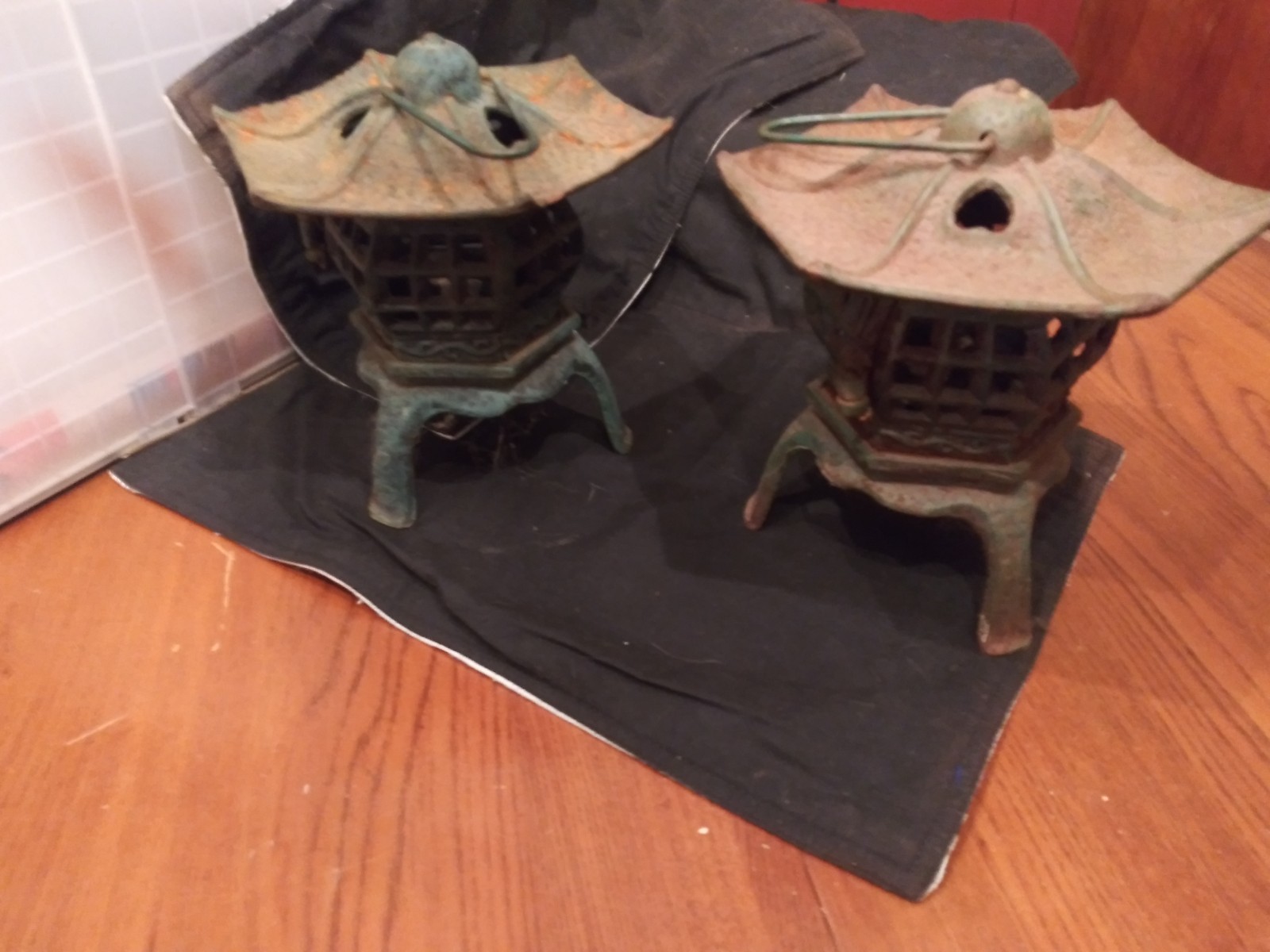 pair of 1940\'s cast iron japanese pagoda lanterns