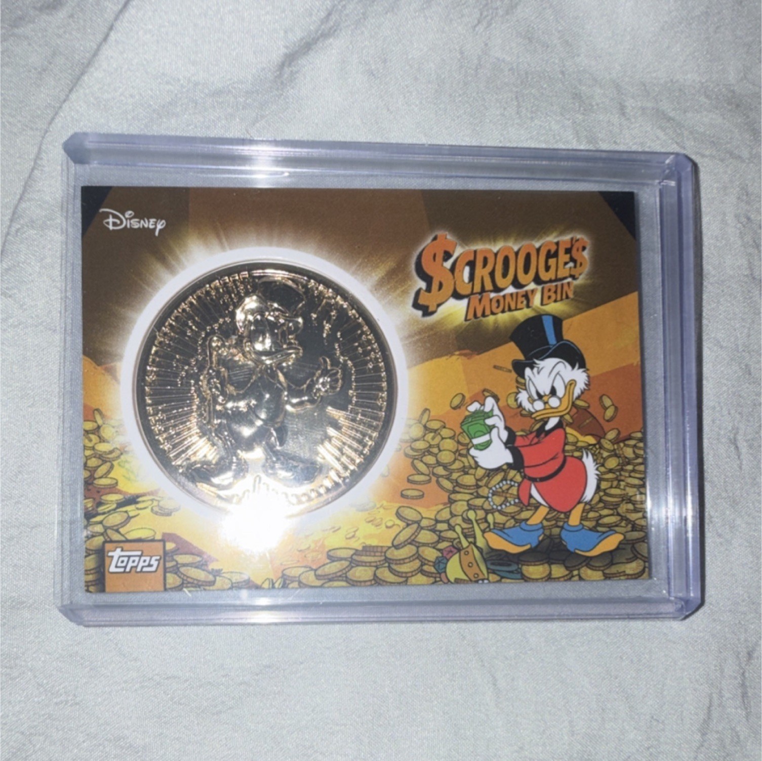 Topps Disney Scrooge McDuck Scrooge\'s Money Bin Metal Coin Relic Card 2026 SMB-1