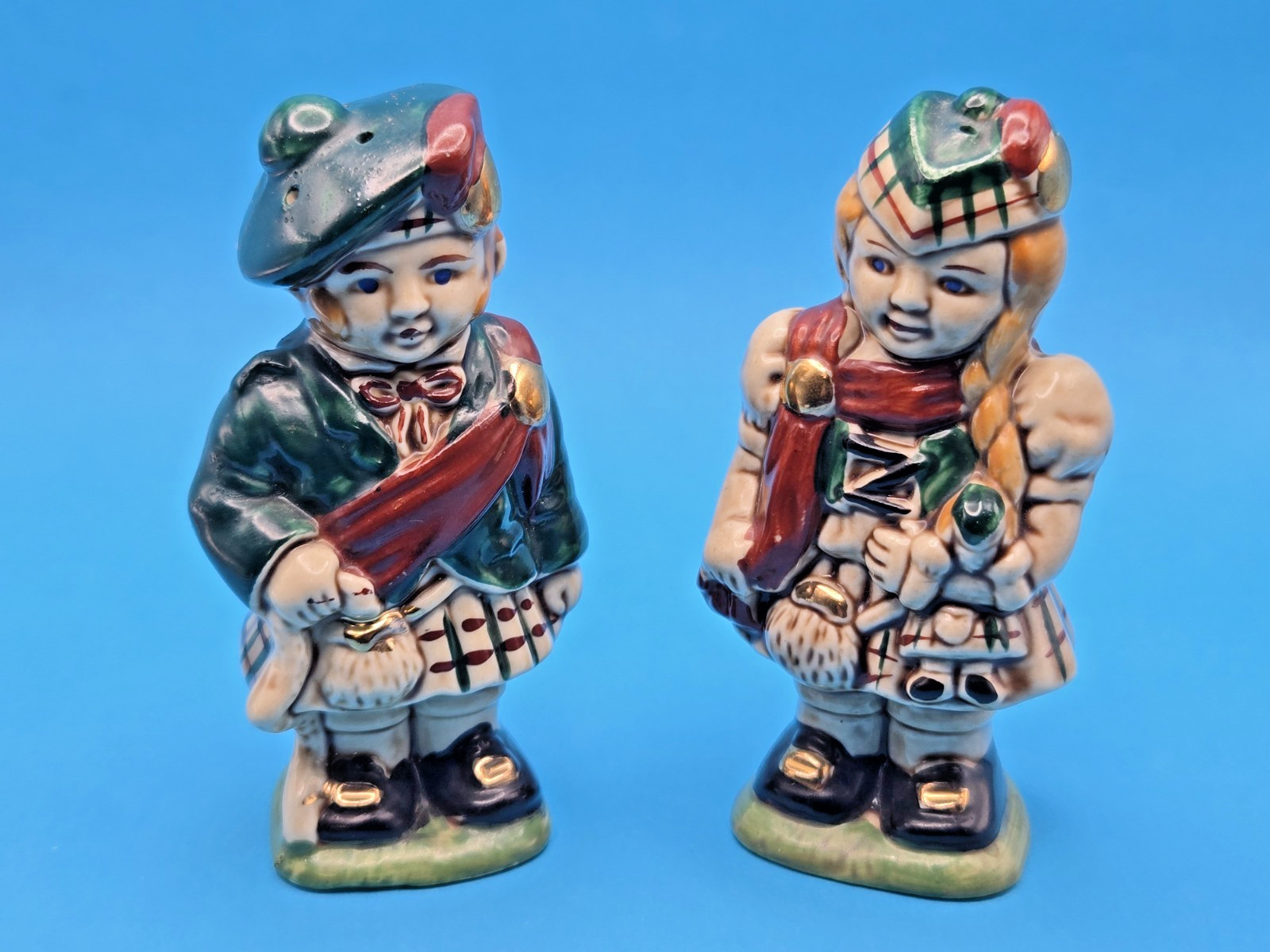 Vintage Scottish Couple Salt and Pepper Shakers with Gold Accents. VG Condition