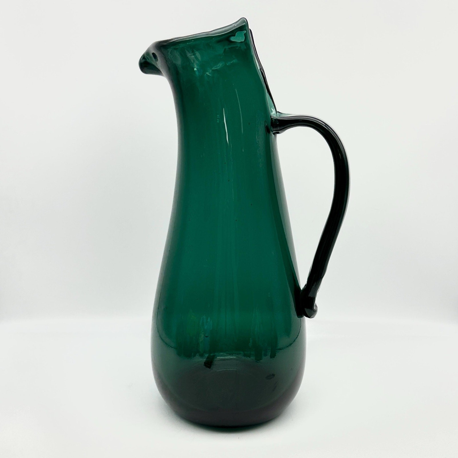 Teal Green Glass Pitcher, Hand Blown, Hand Crafted, 14 3/4” tall Teal Green Glass Pitcher, Hand Blown, Hand Crafted, 14 3/4” tall