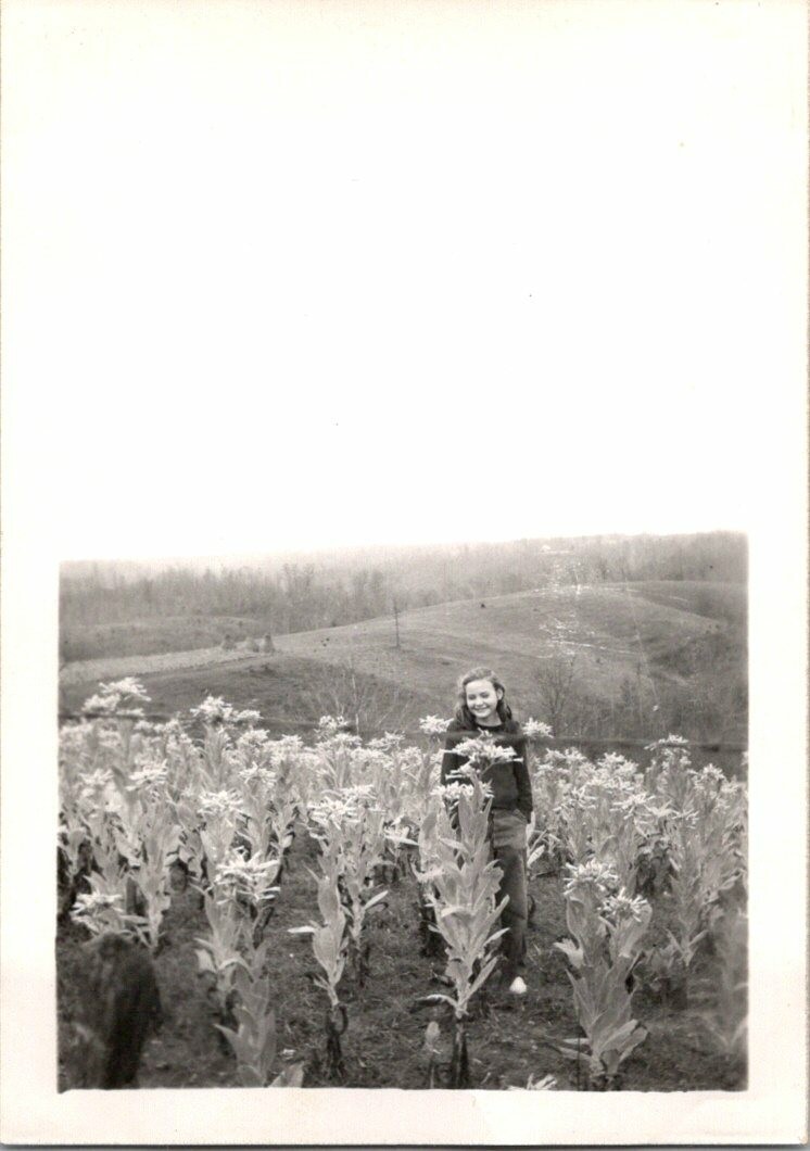 Pretty Young Girl Holding Flowers in Field & Smiling Candid FOUND B+W Photo 0143