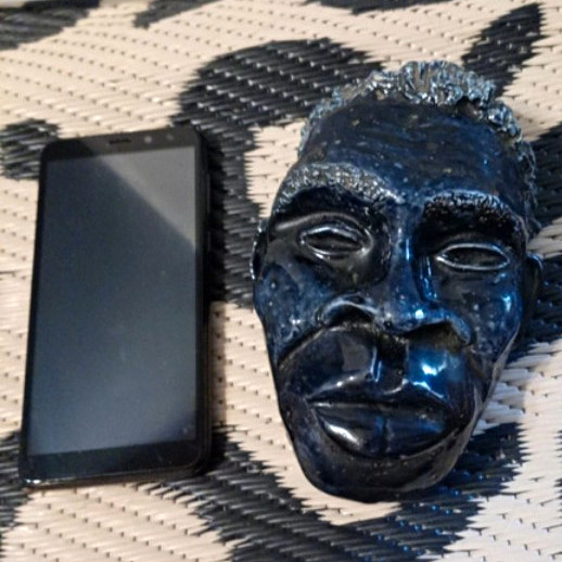 Small African Mask Wall Hanging, Black Glazed Ceramic Collectible 1946